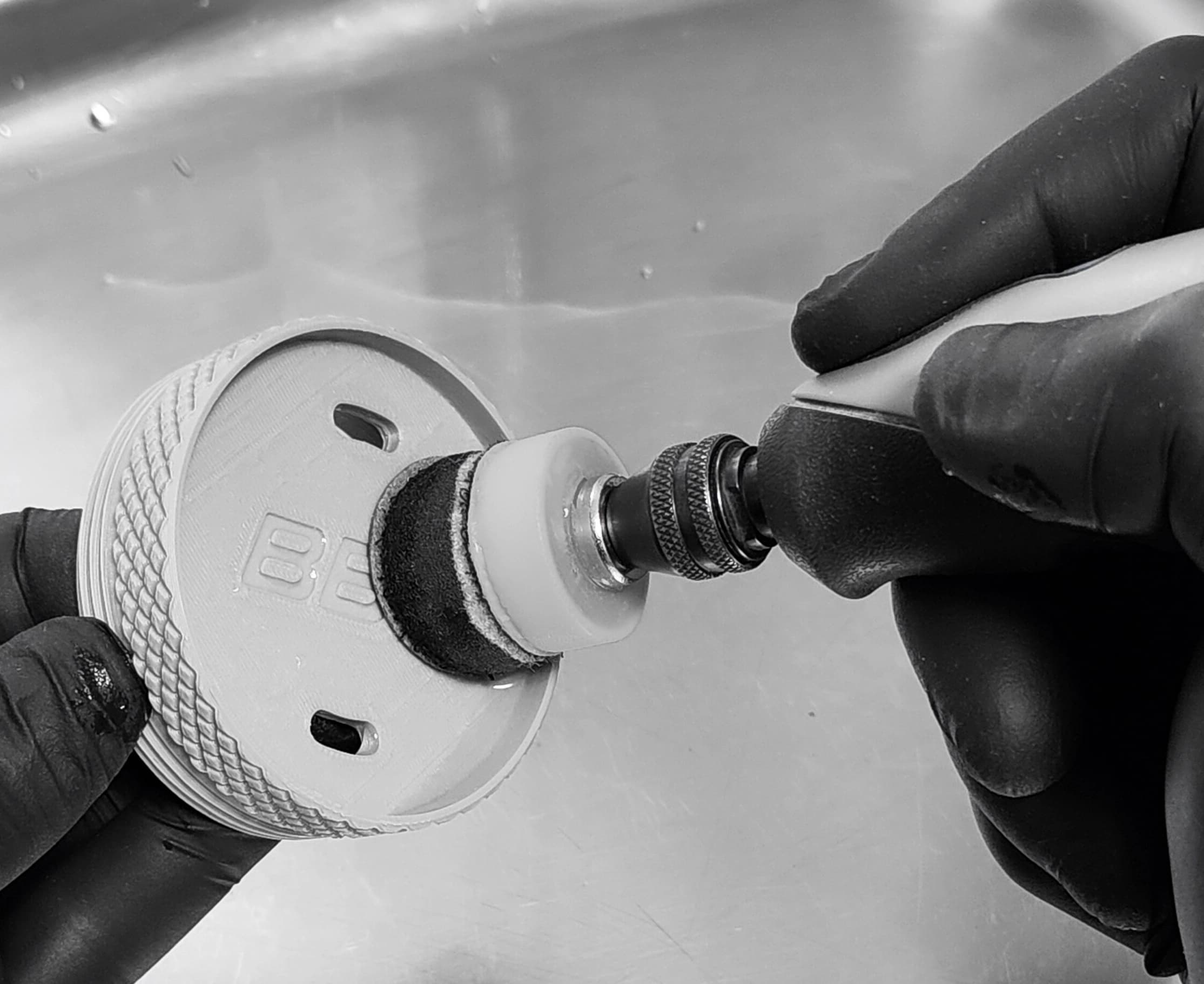 Part being polished with state-of-the-art finishing tools to achieve a professional surface quality in Light Mode